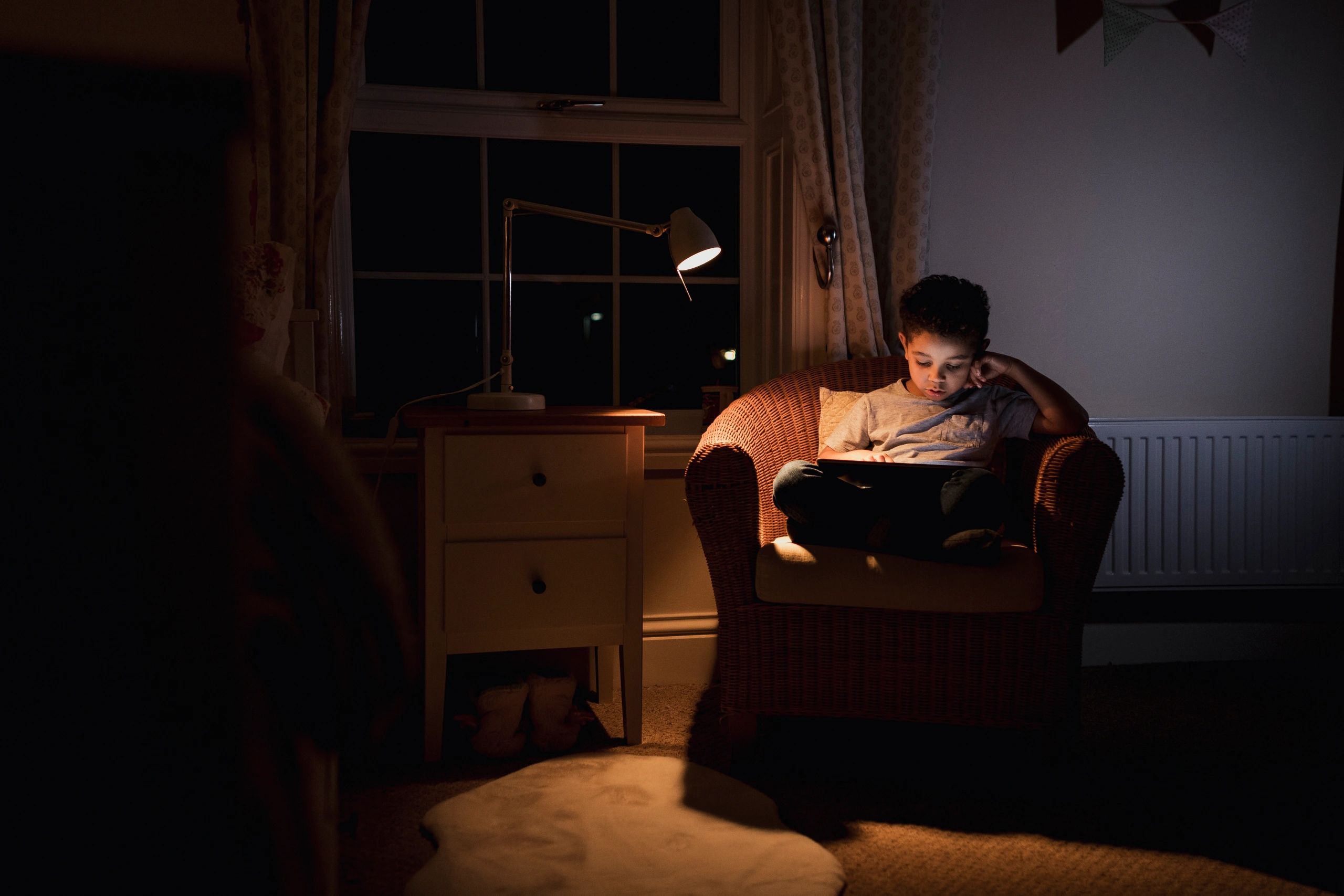 Child focused on digital learning activity