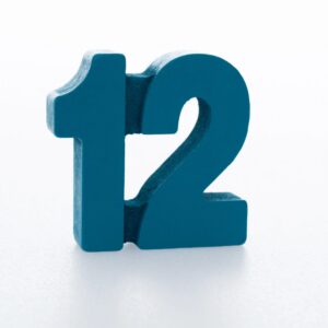 Wooden number 12 on white background