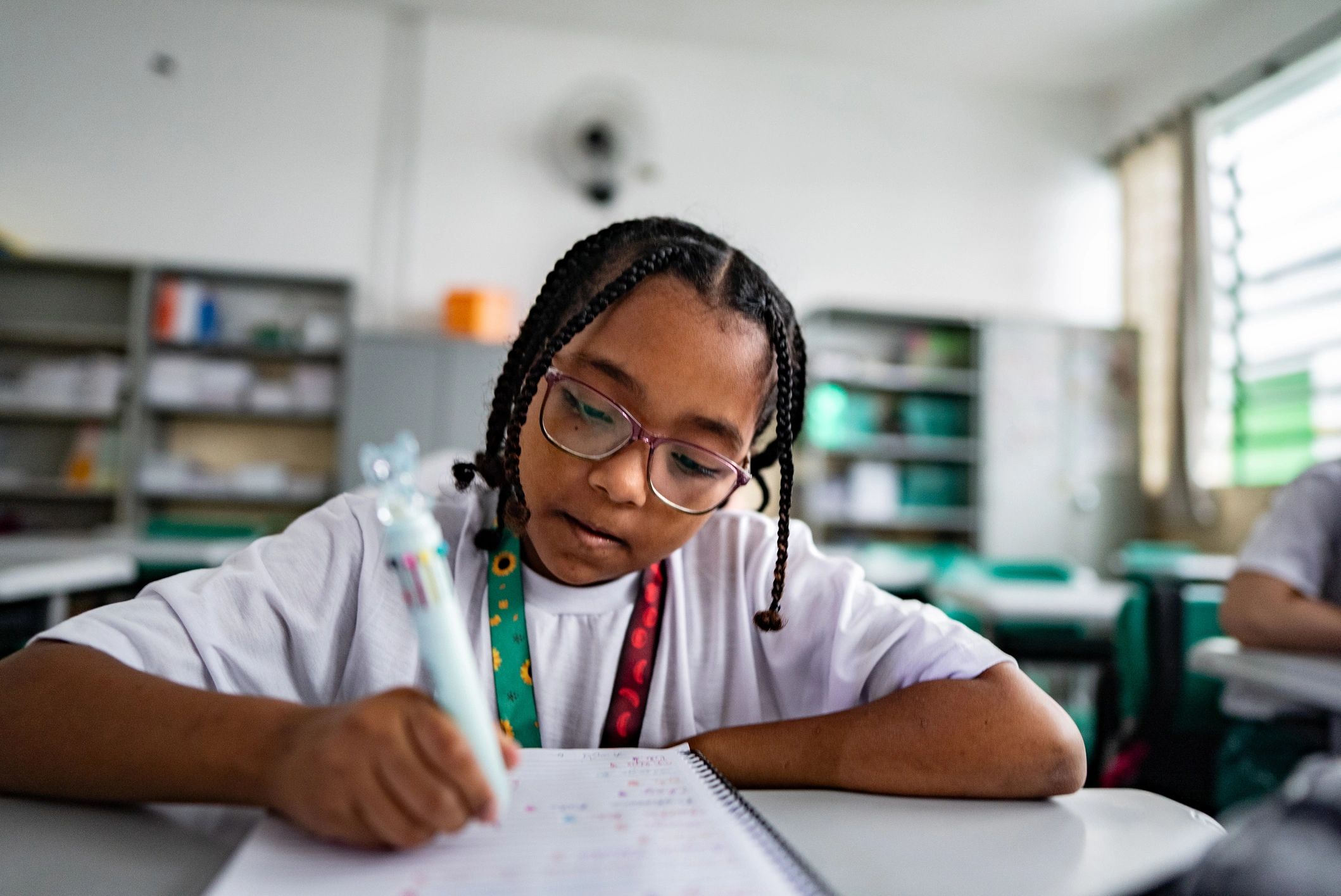Schoolgirl studying in a classroom